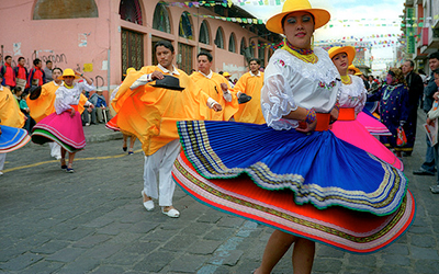 Dancing in traditional costumes in Ecuador