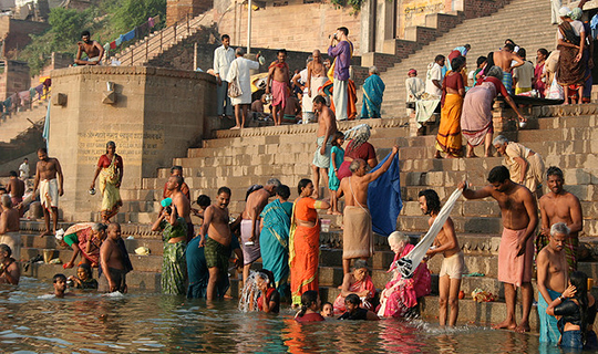 Indians bathe in the Ganges river