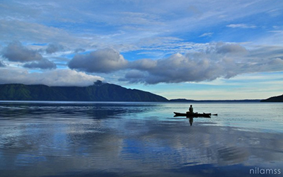 Photo of Fisherman at Ranau Lake, Bali, Indonesia