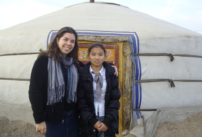 Theresa with Sarantuya in front of a traditional ger (yurt)