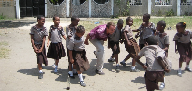 Adam with Tanzanian school children
