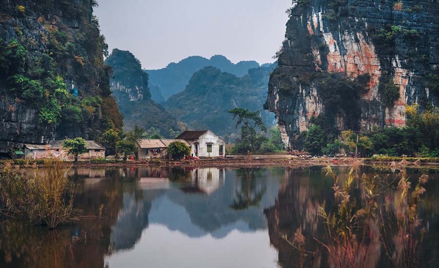 A farm by the lake in Ninh Bình, Vietnam. Photo by Ruslan Bardash