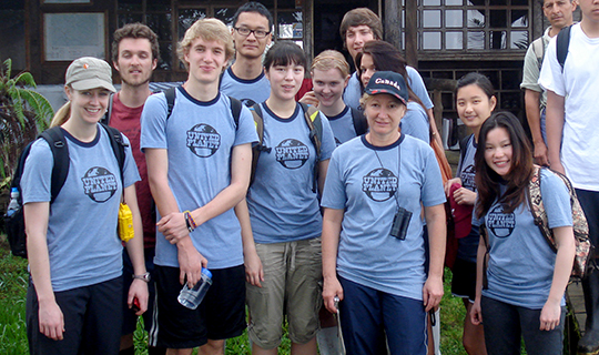 Group of UP Volunteers stand and smile in Ecuador